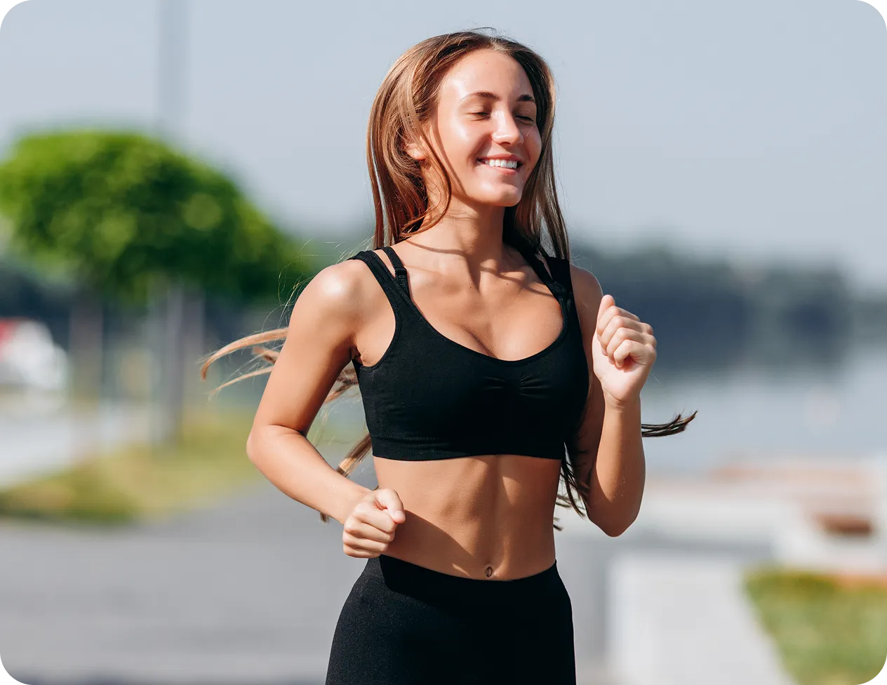 Smiling woman jogging outdoors