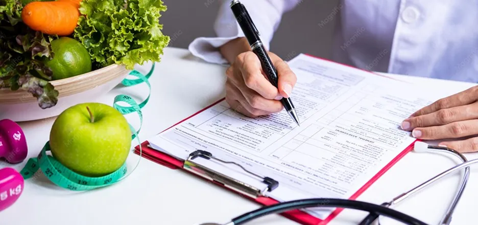 Physician writing a personalized prescription next to fresh fruit